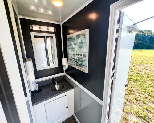 IMG_0679. 4 STALL SAT WHITE SINK AREA DOOR OPEN